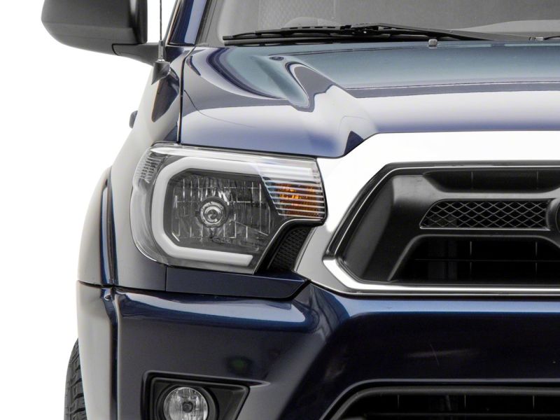 Raxiom for 2012-2015 Toyota Tacoma Axial Series Headlights w/ LED Bar- Black Housing (Clear Lens) - Image 7