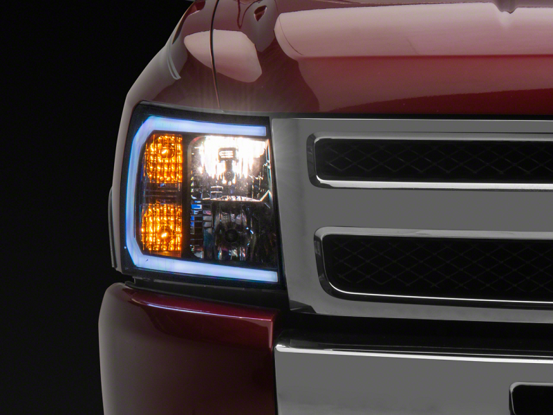 Raxiom for 2007-2013 Chevrolet Silverado 1500 Axial Headlights w/ SEQL LED Bar- Black Housing (Clear Lens)