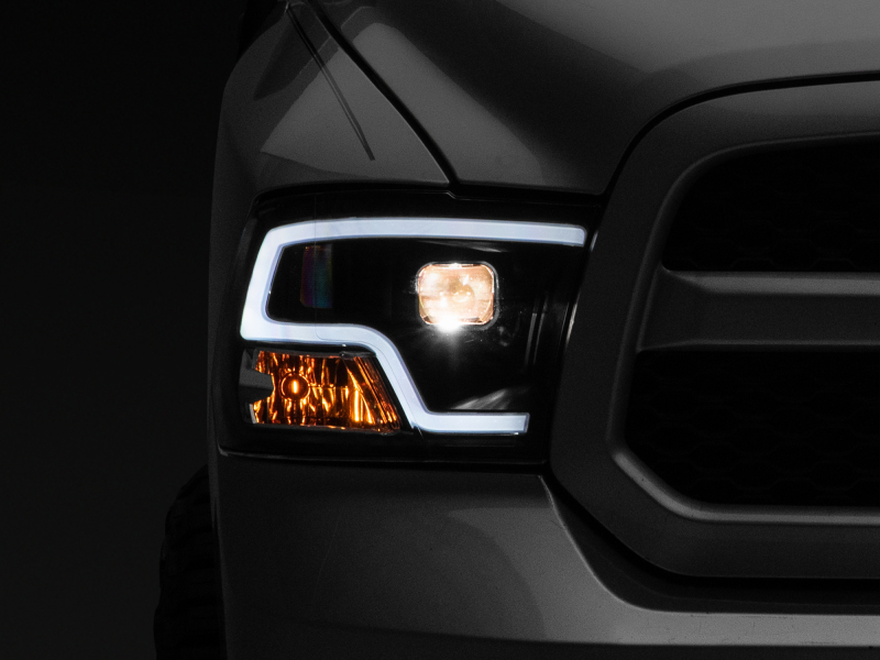 Raxiom for 2009-2018 RAM 1500 LED Halo Projector Headlights- Black Housing (Clear Lens)
