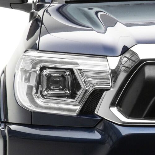Raxiom for 2012-2015 Toyota Tacoma Axial Series Switchback Projector Headlights- Chrome- Clear Lens