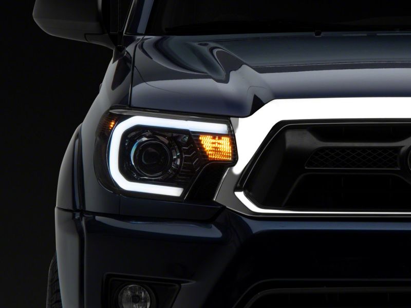 Raxiom for 2012-2015 Toyota Tacoma Axial Series Projector Headlights w/ LED Bar- Black Housing (Clear Lens) - Image 7