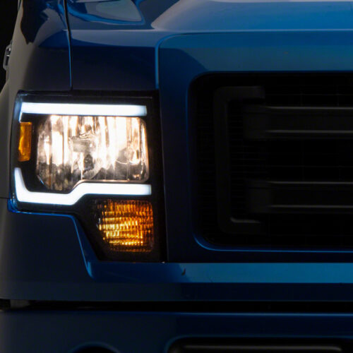 Raxiom for 2009-2014 Ford F-150 Axial Series Headlights w/ LED Bar- Black Housing (Clear Lens)