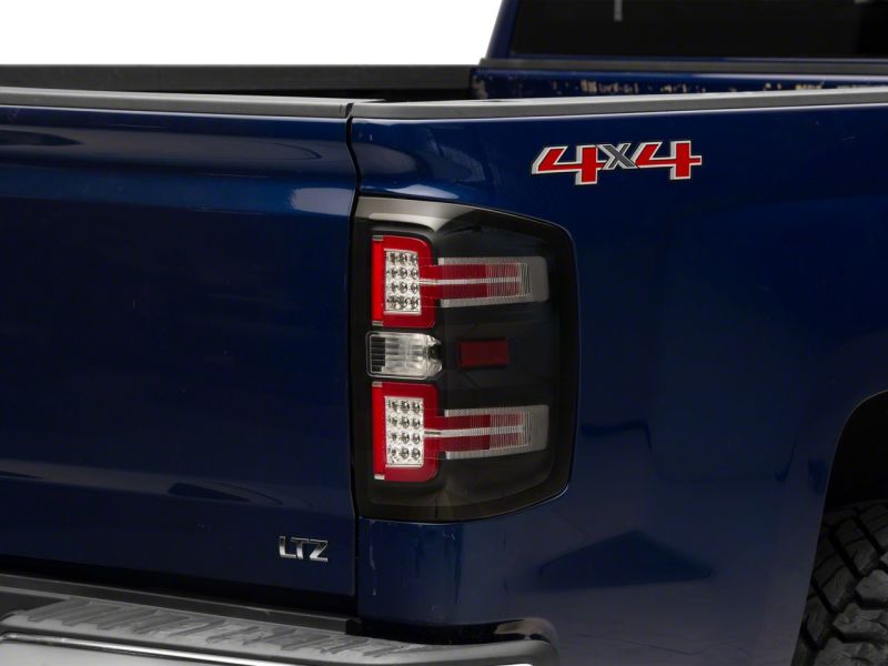 Raxiom for 2014-2018 Chevrolet Silverado 1500 LED Taillights w/ SEQL Turn Signals- Blk Housing (Clear Lens) - Image 2