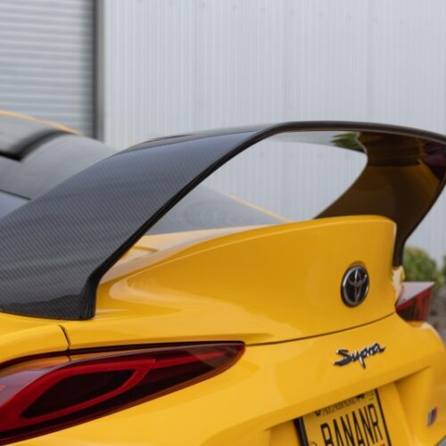 Dinan 20-26 Toyota GR Supra (A90/A91) Carbon Fiber High-Rise Rear Spoiler - Image 7