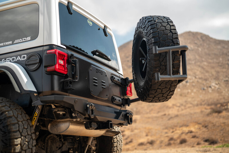 DV8 Offroad 18-25 Jeep Wrangler JL Body Mounted Tire Carrier - Image 3