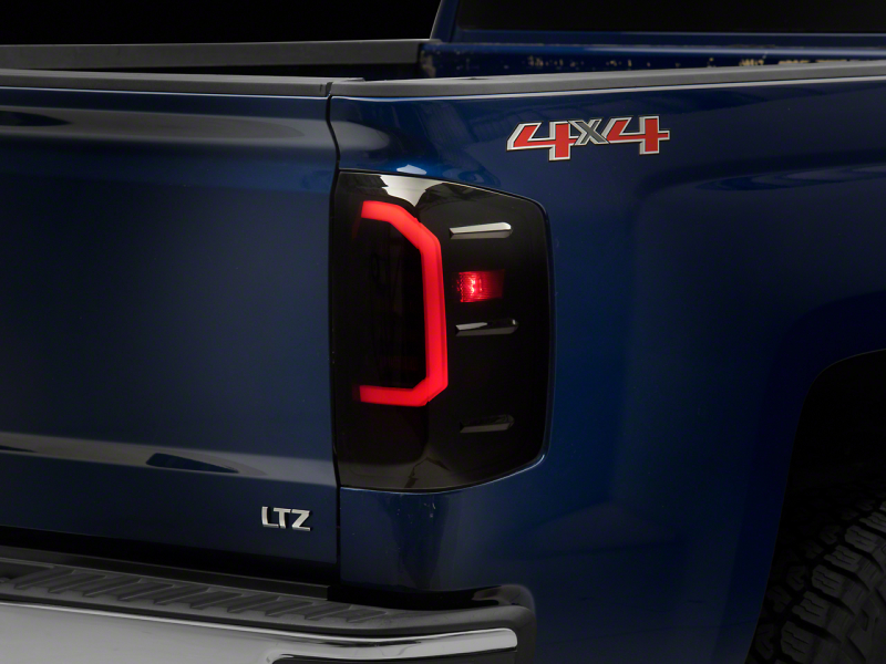 Raxiom for 2014-2018 Chevrolet Silverado 1500 Axial Series LED Tail Lights- Black Housing (Smoked Lens)