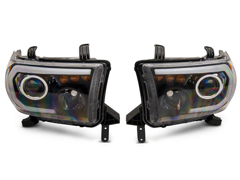 Raxiom for 2007-2013 Toyota Tundra Axial Series Projector Headlights w/ LED Bar- Black Housing (Clear Lens)
