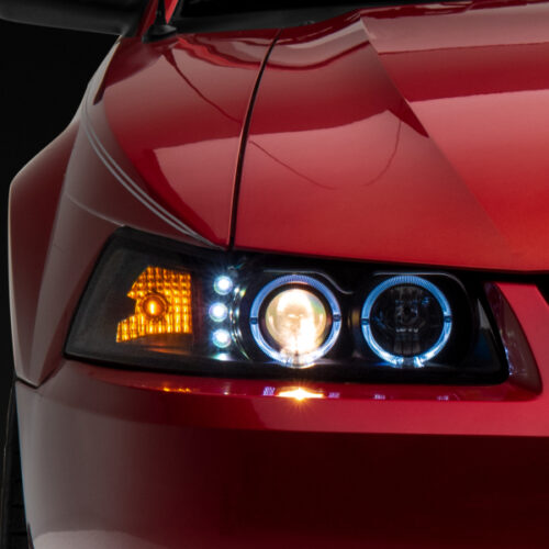 Raxiom for 1999-2004 Ford Mustang Dual LED Halo Projector Headlights- Black Housing (Clear Lens)