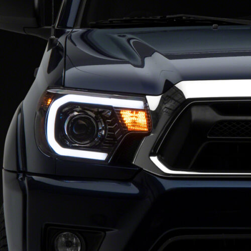 Raxiom for 2012-2015 Toyota Tacoma Axial Projector Headlights w/ SEQL LED Bar- Black Housing (Clear Lens)
