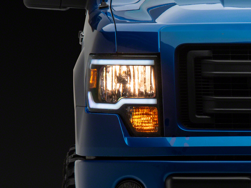 Raxiom for 2009-2014 Ford F-150 Axial Series Headlight w/ SEQL LED Bar- Black Housing (Clear Lens)