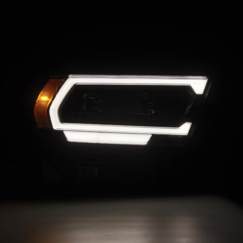 Alternative view of AlphaRex 19-22 Dodge Ram 1500 PRO-Series Projector Headlights Alpha Black w/Seq Signal/DRL