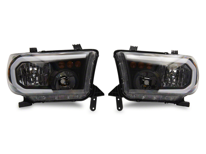 Raxiom for 2007-2013 Toyota Tundra Axial Series Headlights w/ SEQL LED Bar- Black Housing (Clear Lens)
