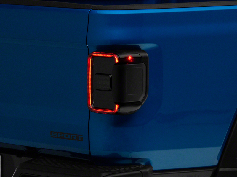 Raxiom for 2020-2023 Jeep Gladiator JT w/ Factory Halogen LED Tail Lights- Black Housing (Smoked Lens)
