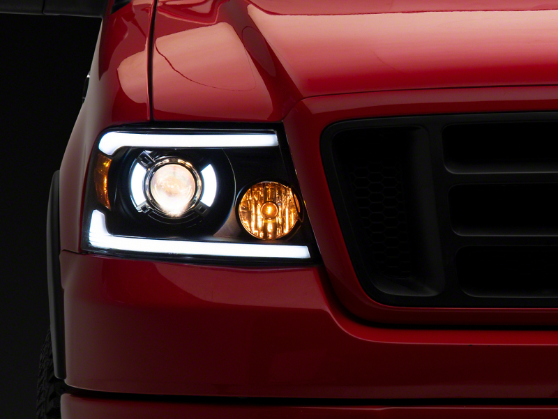Raxiom for 2004-2008 Ford F-150 Axial Series Projector Headlights with LED Bar- Black Housing- Clear Lens