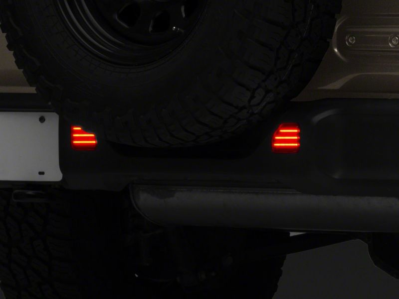 Raxiom for 2018-2023 Jeep Wrangler JL Moab Rubicon Sahara Axial LED Rear Bumper Reflector Lights- Smoked - Image 4