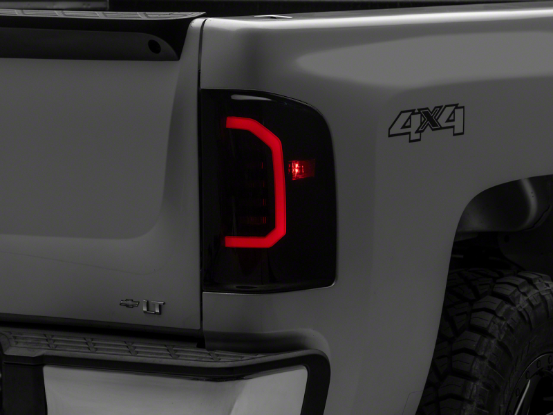 Raxiom for 2007-2014 Chevrolet Silverado 1500 Axial Series LED Tail Lights- Black Housing (Smoked Lens)