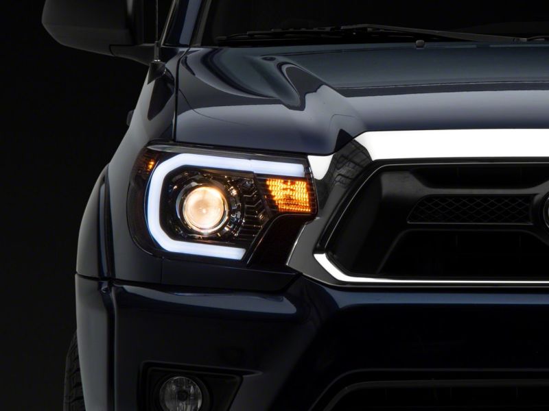 Raxiom for 2012-2015 Toyota Tacoma Axial Projector Headlights w/ SEQL LED Bar- Black Housing (Clear Lens) - Image 7