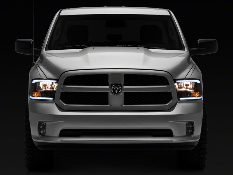 Raxiom for 2009-2018 Dodge RAM 1500/2500/3500 Axial Headlights w/ SEQL LED Bar- Black Housing (Clear Lens) - Image 10