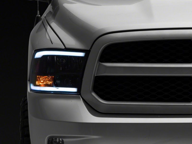 Raxiom for 2009-2018 Dodge RAM 1500/2500/3500 Axial Headlights w/ SEQL LED Bar- Black Housing (Clear Lens) - Image 6