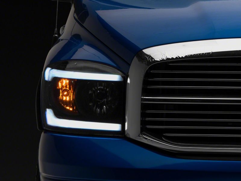 Raxiom for 2006-2009 Dodge RAM 1500/2500/3500 Axial Headlights w/ SEQL LED Bar- Black Housing (Clear Lens) - Image 7