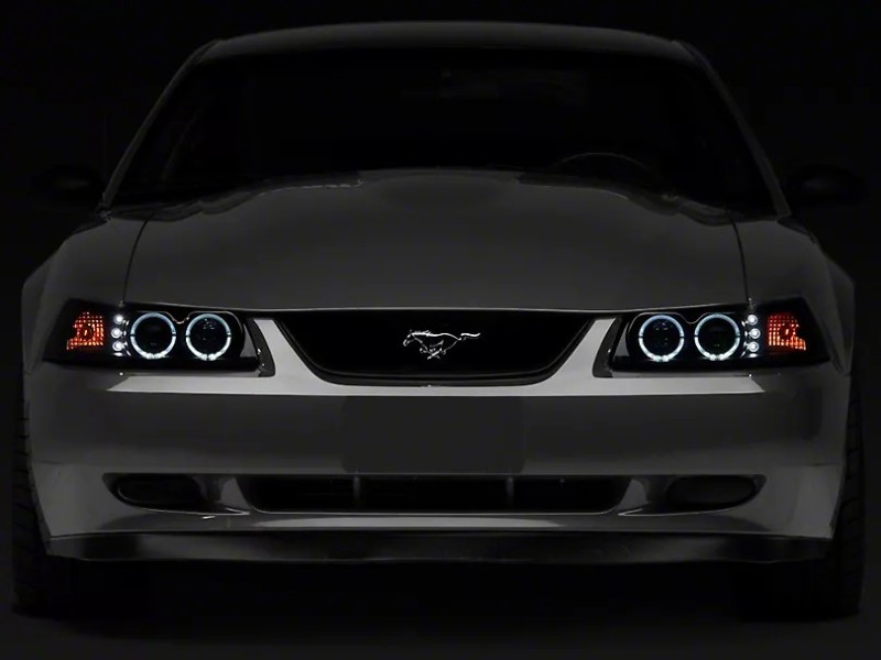 Raxiom for 1999-2004 Ford Mustang Dual LED Halo Projector Headlights- Black Housing (Smoked Lens)