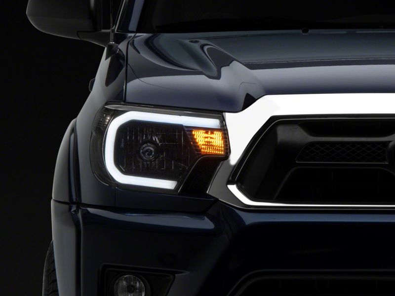 Raxiom for 2012-2015 Toyota Tacoma Axial Series Headlights w/ LED Bar- Black Housing (Clear Lens) - Image 5