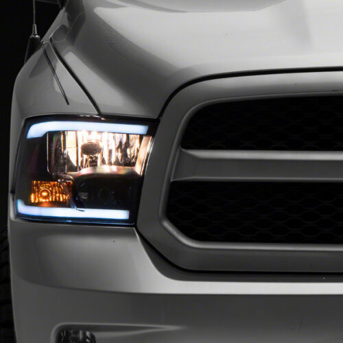 Raxiom for 2009-2018 Dodge RAM 1500/2500/3500 Axial Headlights w/ SEQL LED Bar- Black Housing (Clear Lens)
