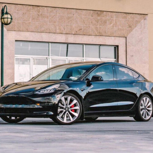 Rally Armor 17-23 Tesla Model 3 Black UR Mud Flap - Metallic Black Logo - Image 2