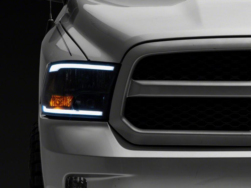Raxiom for 2009-2018 Dodge RAM 1500/2500/3500 Axial Series Headlights w/ LED Bar- Black Housing (Clear Lens) - Image 6