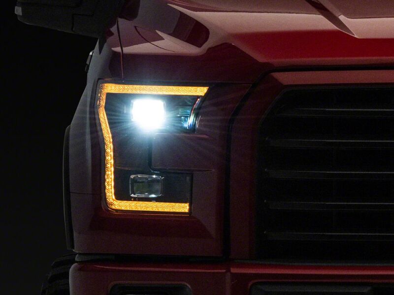 Raxiom for 2015-2017 Ford F-150 LED Projector Headlights with LED Amber DRL- Black Housing- Clear Lens