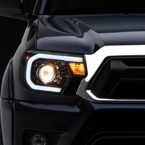 Raxiom for 2012-2015 Toyota Tacoma Axial Series Projector Headlights w/ LED Bar- Black Housing (Clear Lens)