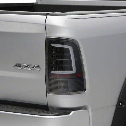 Raxiom for 2009-2018 Dodge RAM 1500 Axial Series LED Tail Lights- Black Housing- Clear Lens