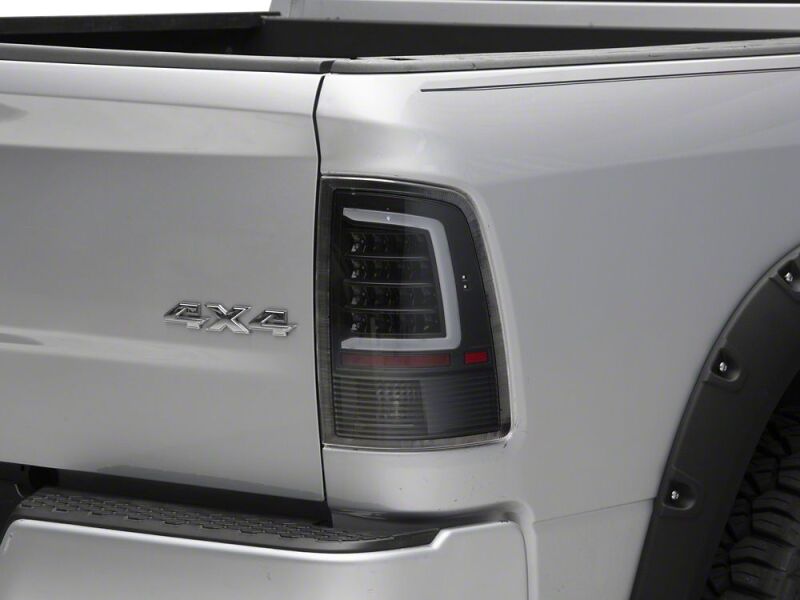Raxiom for 2009-2018 Dodge RAM 1500 Axial Series LED Tail Lights- Black Housing- Clear Lens