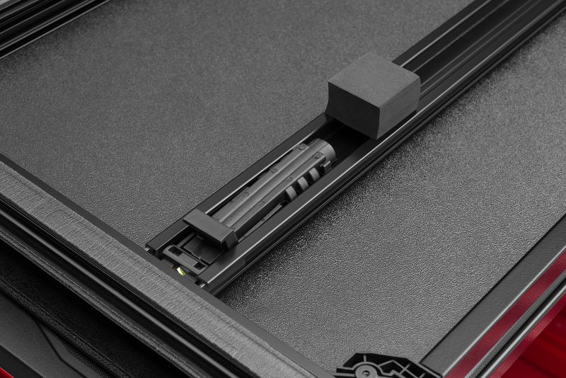 Lund 969250 02-17 Dodge Ram 1500 Fleetside (6.4ft. Bed) Hard Fold Tonneau Cover - Black - Image 9