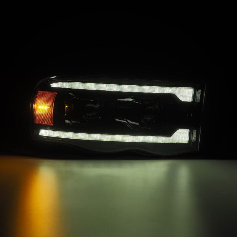 AlphaRex 02-05 Dodge Ram 1500 PRO-Series Projector Headlights Plank Style Alpha Black w/Seq Signal - Image 4