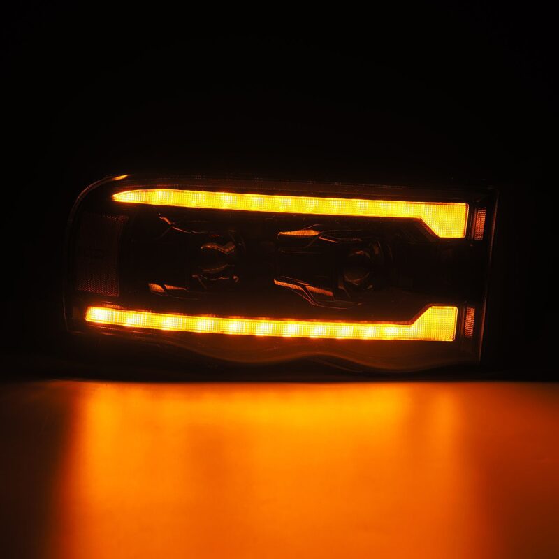 AlphaRex 02-05 Dodge Ram 1500 PRO-Series Projector Headlights Plank Style Alpha Black w/Seq Signal - Image 5