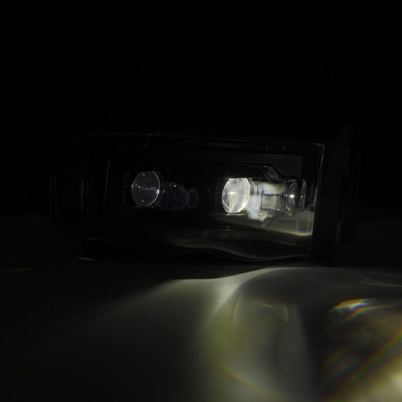 AlphaRex 02-05 Dodge Ram 1500 PRO-Series Projector Headlights Plank Style Alpha Black w/Seq Signal - Image 3